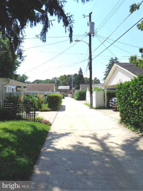 3002 Dunbrin Road Baltimore, MD 21222 - Photo 29 of 30 a view of a house with a yard