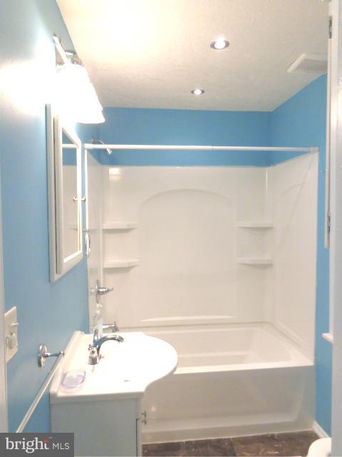 3002 Dunbrin Road Baltimore, MD 21222 - Photo 8 of 30 a bathroom with a shower and a sink