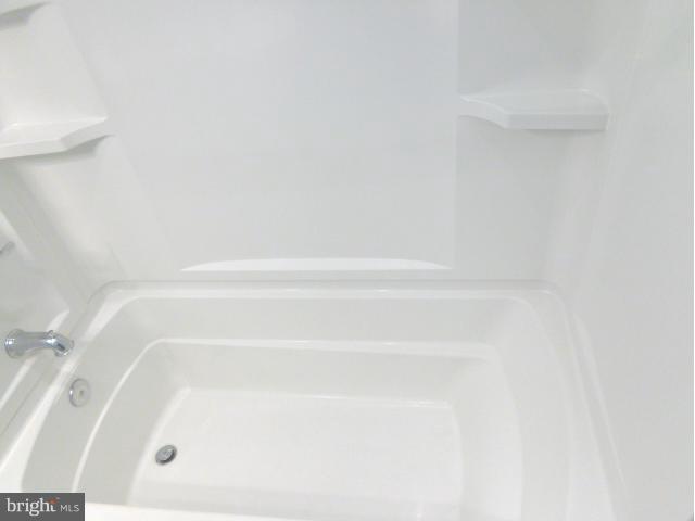 3002 Dunbrin Road Baltimore, MD 21222 - Photo 9 of 30 a bathroom with a bathtub