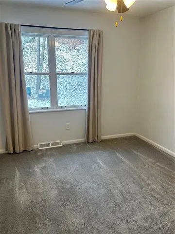 an empty room with a window