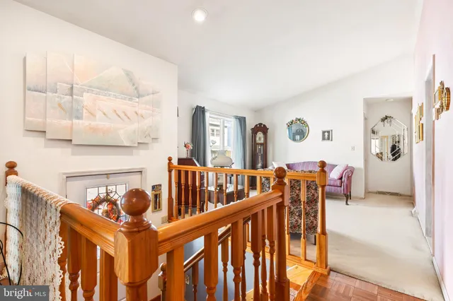 a view of an chairs and table in a balcony
