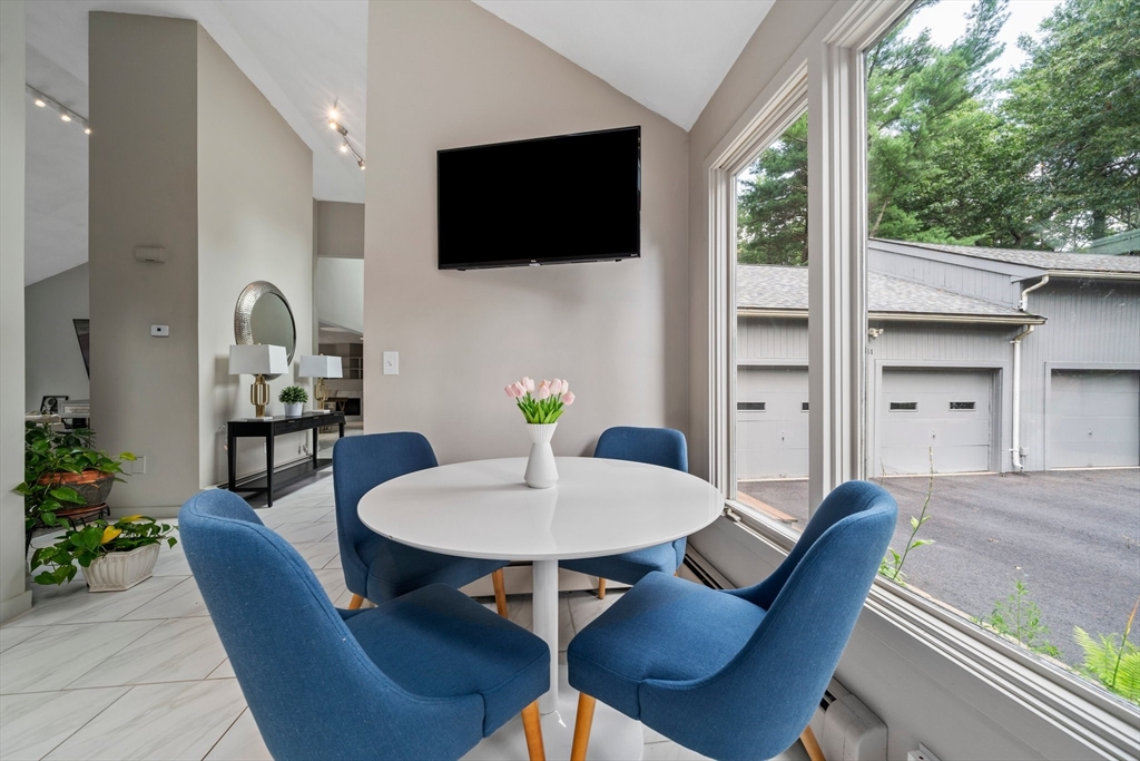 31 Dedham Street Sharon, MA 02067 - Photo 11 of 42 a view of a dining room with furniture window and wooden floor