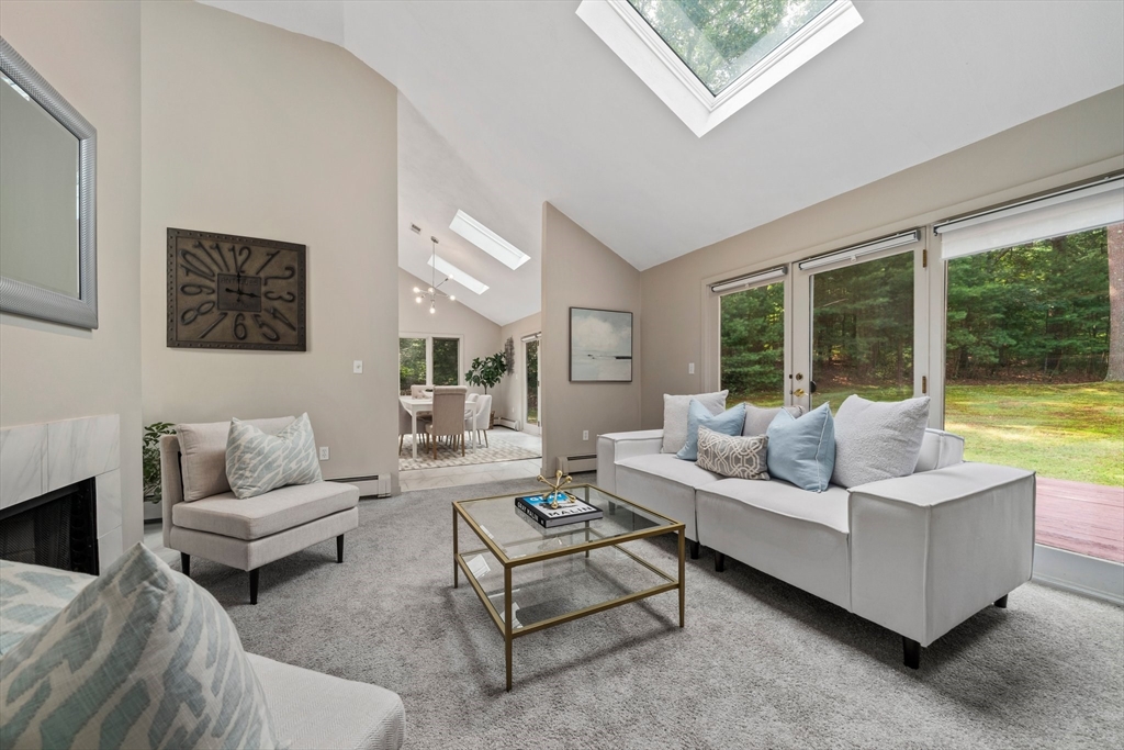 31 Dedham Street Sharon, MA 02067 - Photo 15 of 42 a living room with furniture and a large window