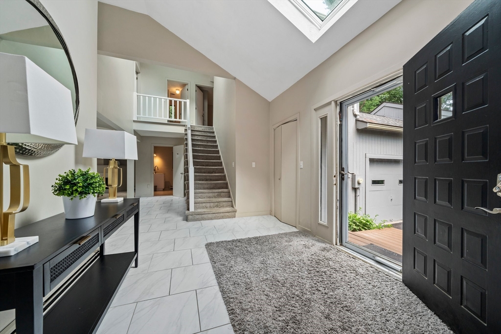 31 Dedham Street Sharon, MA 02067 - Photo 21 of 42 a view of livingroom with furniture and staircase
