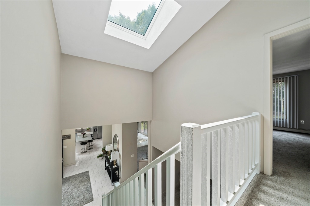 31 Dedham Street Sharon, MA 02067 - Photo 29 of 42 a view of a hallway with entryway and stairs