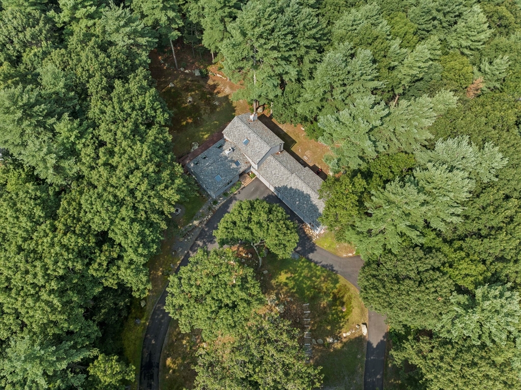 31 Dedham Street Sharon, MA 02067 - Photo 3 of 42 a aerial view of a house with a yard