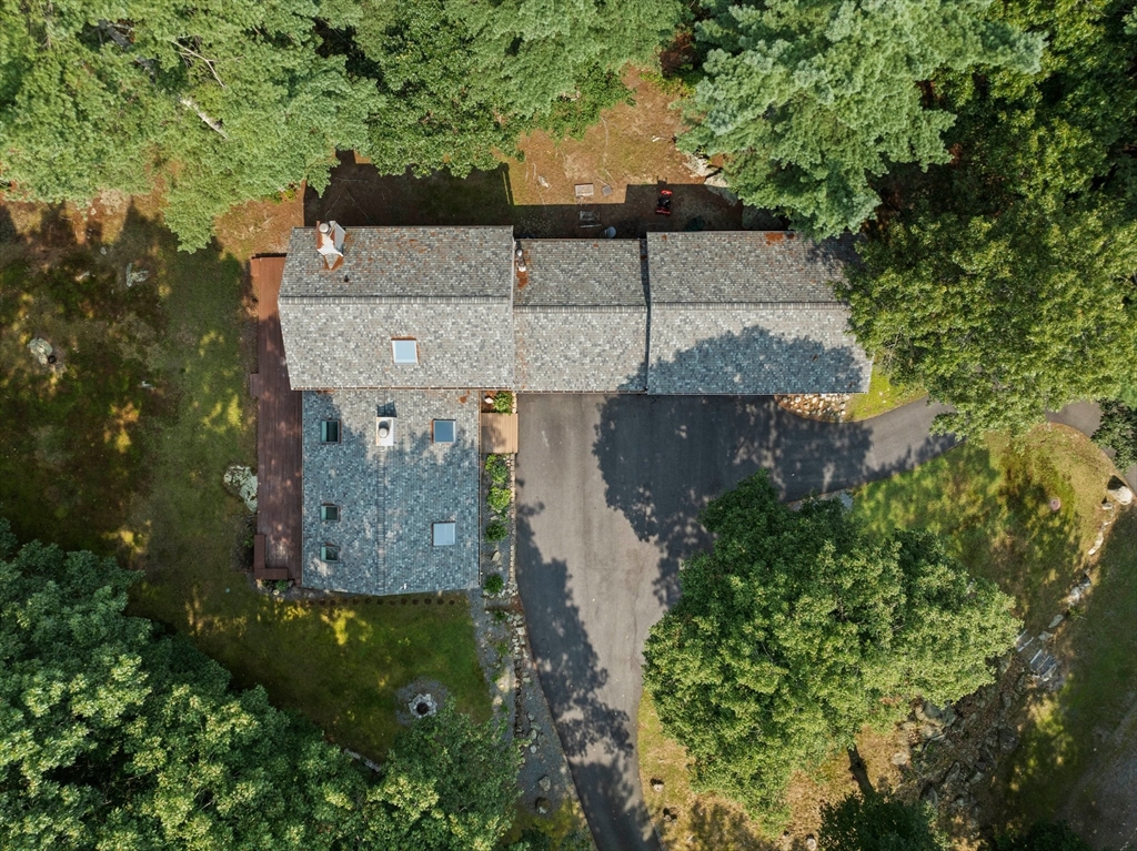 31 Dedham Street Sharon, MA 02067 - Photo 33 of 42 an aerial view of a house with a yard