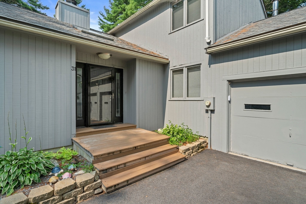 31 Dedham Street Sharon, MA 02067 - Photo 5 of 42 a view of a entryway door of the house