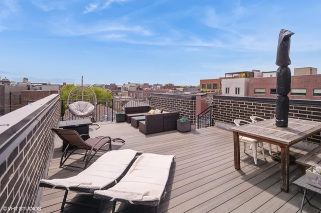 a view of a terrace with sitting area