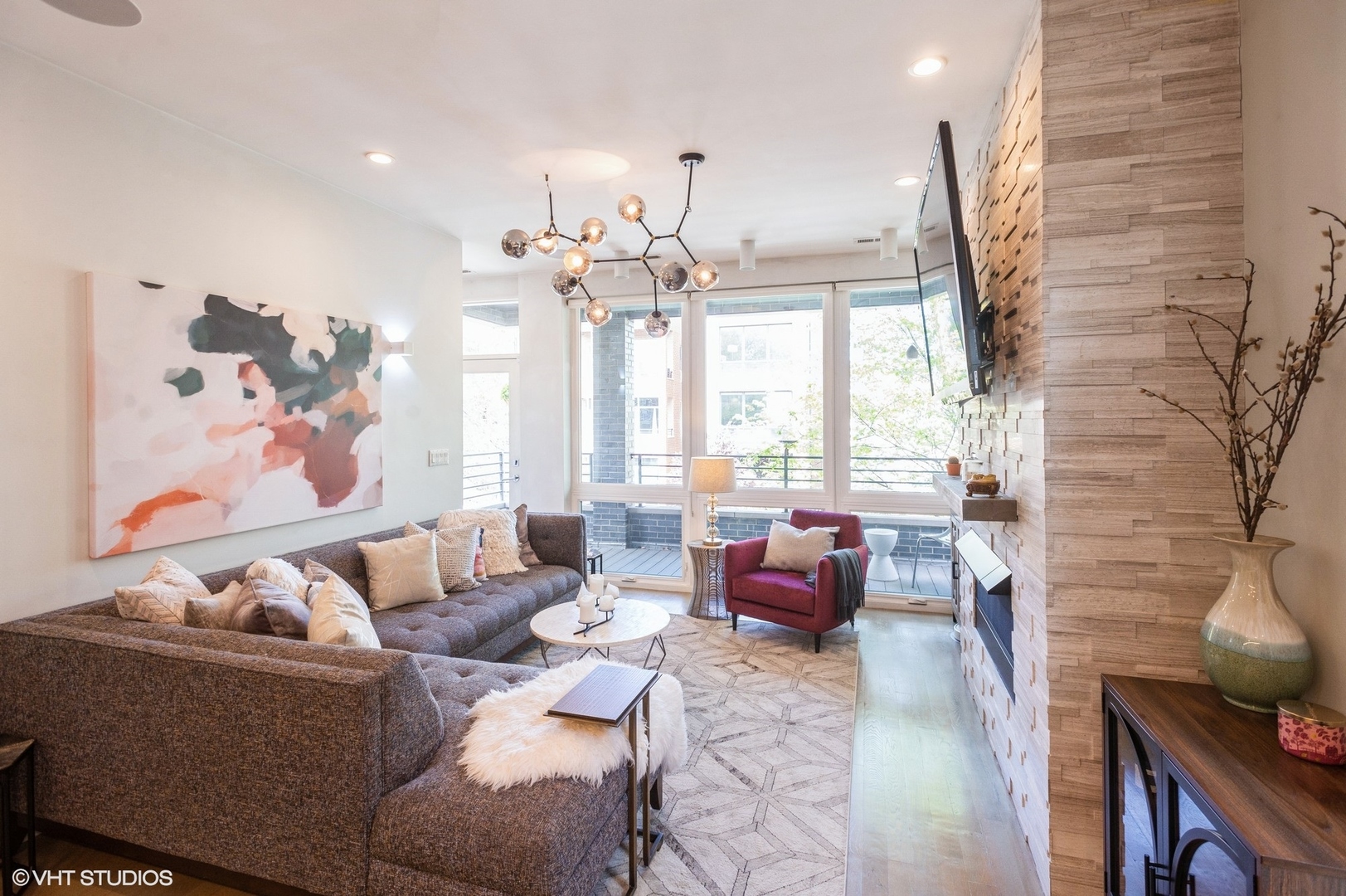 1543 West Augusta Boulevard, Unit 2 Chicago, IL 60642 - Photo 2 of 21 a living room with furniture and a large window