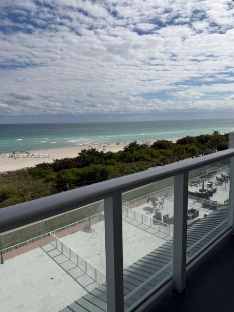 5601 Collins Avenue, Unit 607 Miami Beach, FL 33140 - Photo 5 of 22 a view of swimming pool from a balcony