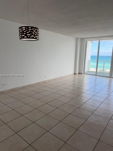 5601 Collins Avenue, Unit 607 Miami Beach, FL 33140 - Photo 8 of 22 a view of an empty room and a window