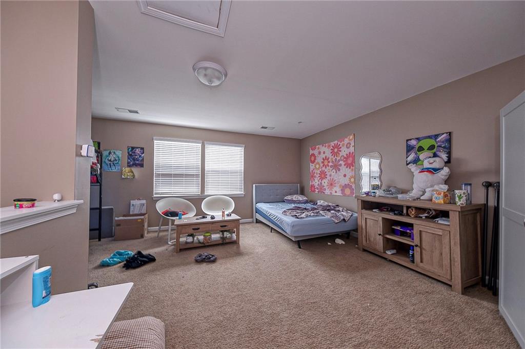 137 Lewisham Road Cranberry Township, PA 16066 - Photo 15 of 16 a living room with furniture and a flat screen tv