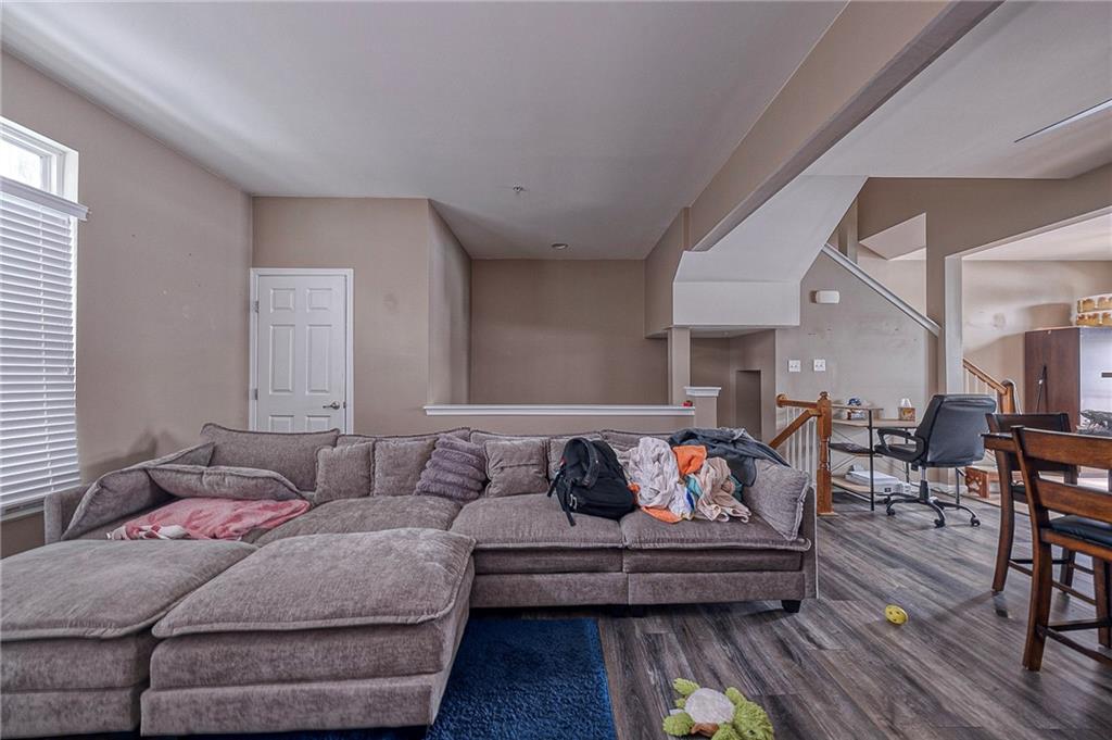 137 Lewisham Road Cranberry Township, PA 16066 - Photo 2 of 16 a living room with furniture and wooden floor