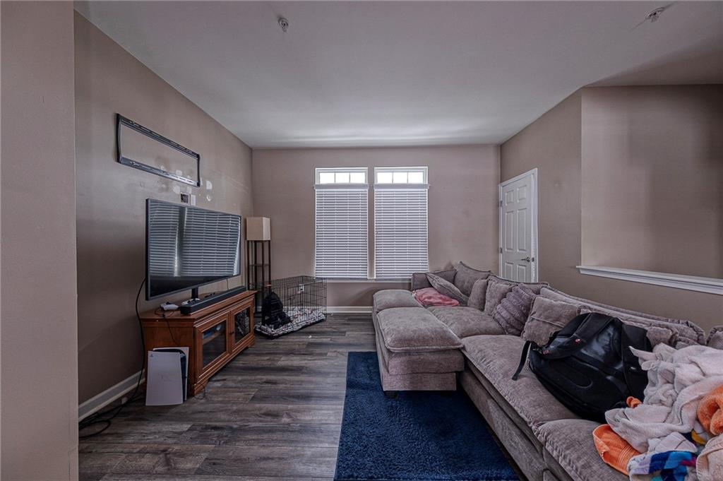 137 Lewisham Road Cranberry Township, PA 16066 - Photo 3 of 16 a living room with furniture and a flat screen tv
