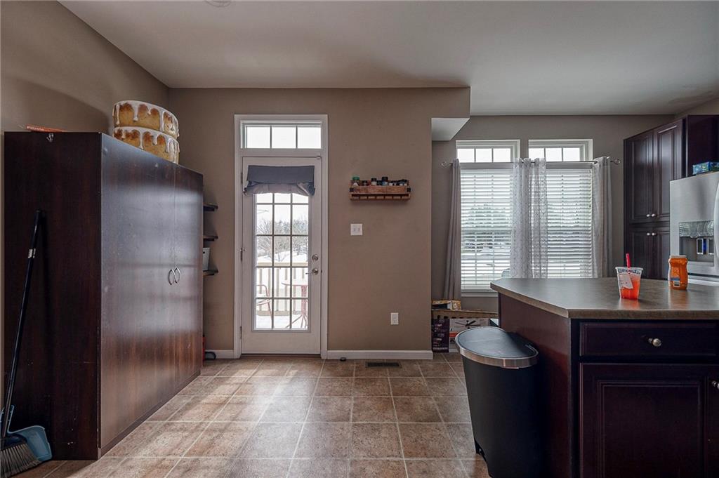 137 Lewisham Road Cranberry Township, PA 16066 - Photo 7 of 16 a view of a refrigerator and window in a room
