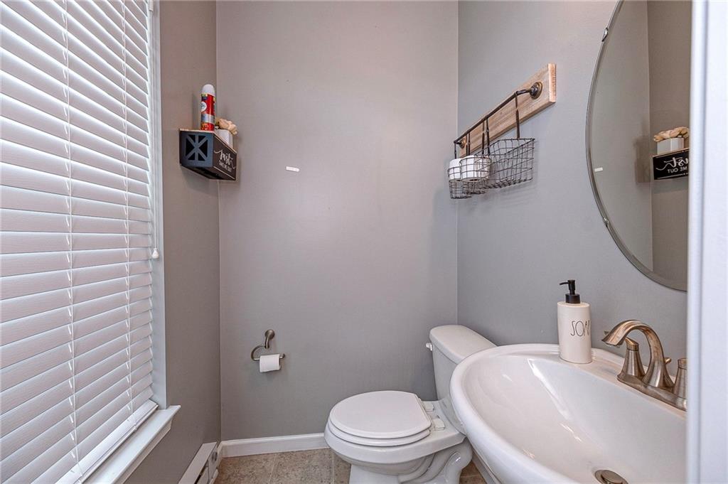 137 Lewisham Road Cranberry Township, PA 16066 - Photo 8 of 16 a bathroom with a toilet and a sink