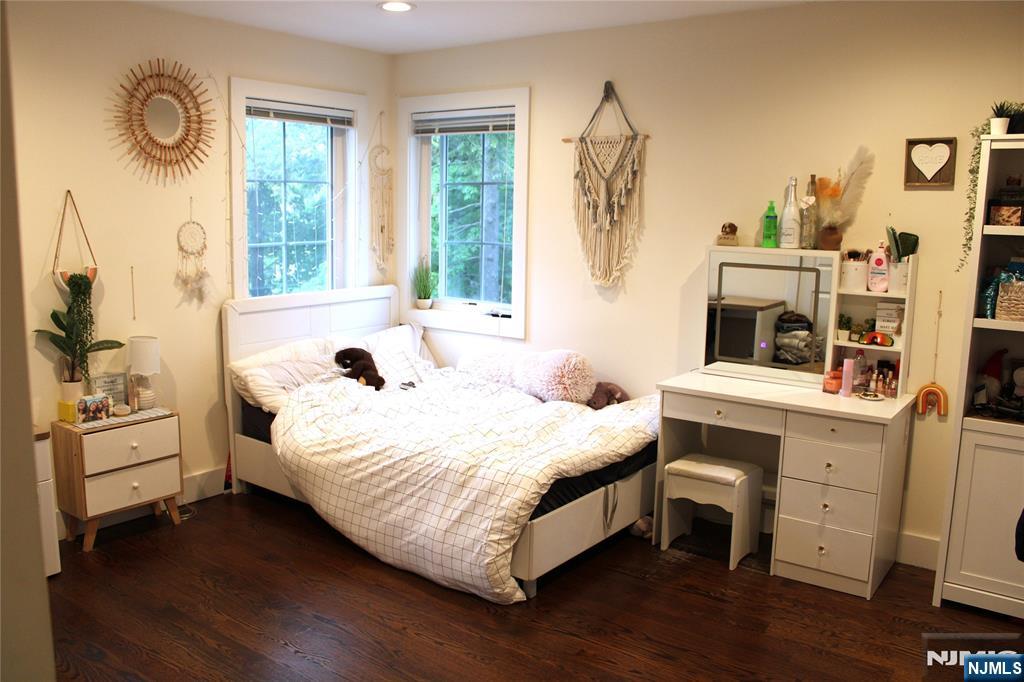 294-296 Tenafly Road Tenafly, NJ 07670 - Photo 15 of 24 a bedroom with a bed and a desk