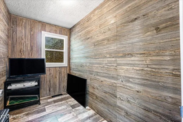 a view of a garden with plants and a lake view