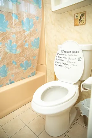 a bathroom with a toilet and a sink
