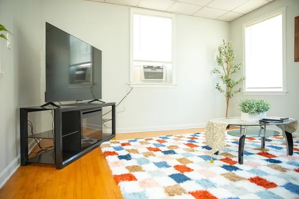 a bedroom with a bed and a table in it