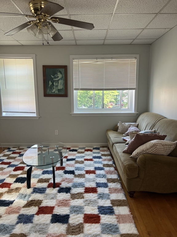 255 Columbia Street, Unit 2 Fall River, MA 02721 - Photo 6 of 15 a bedroom with a bed and a window