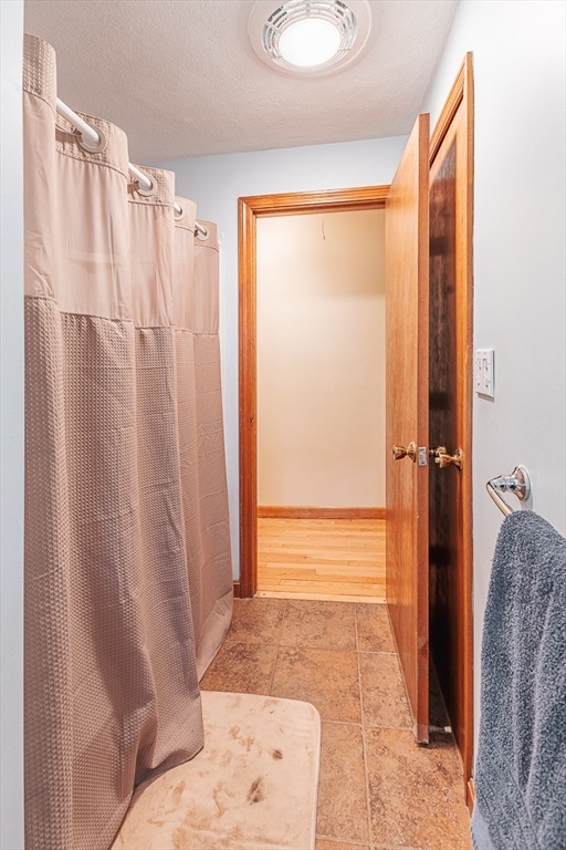 26 Hunter Avenue Hudson, MA 01749 - Photo 17 of 42 a bathroom with a shower and a tub