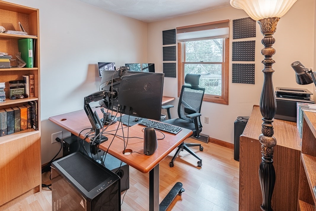 26 Hunter Avenue Hudson, MA 01749 - Photo 20 of 42 a view of a workspace with furniture and a window