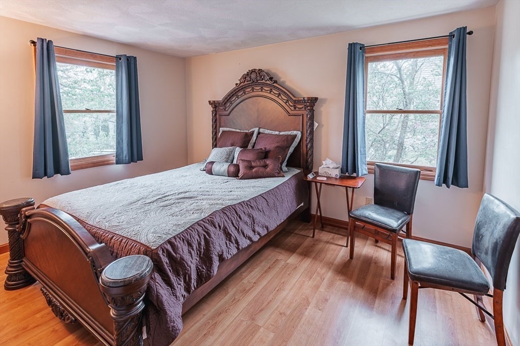 26 Hunter Avenue Hudson, MA 01749 - Photo 22 of 42 a bedroom with a bed chair and window