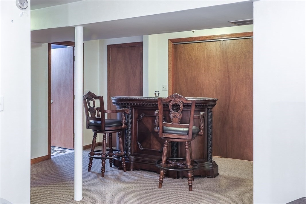 26 Hunter Avenue Hudson, MA 01749 - Photo 30 of 42 a view of a dining room with furniture