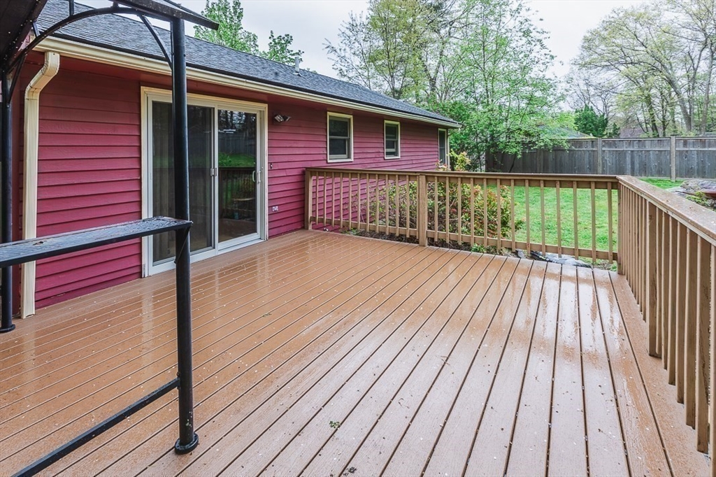26 Hunter Avenue Hudson, MA 01749 - Photo 36 of 42 a view of backyard with deck and wooden floor