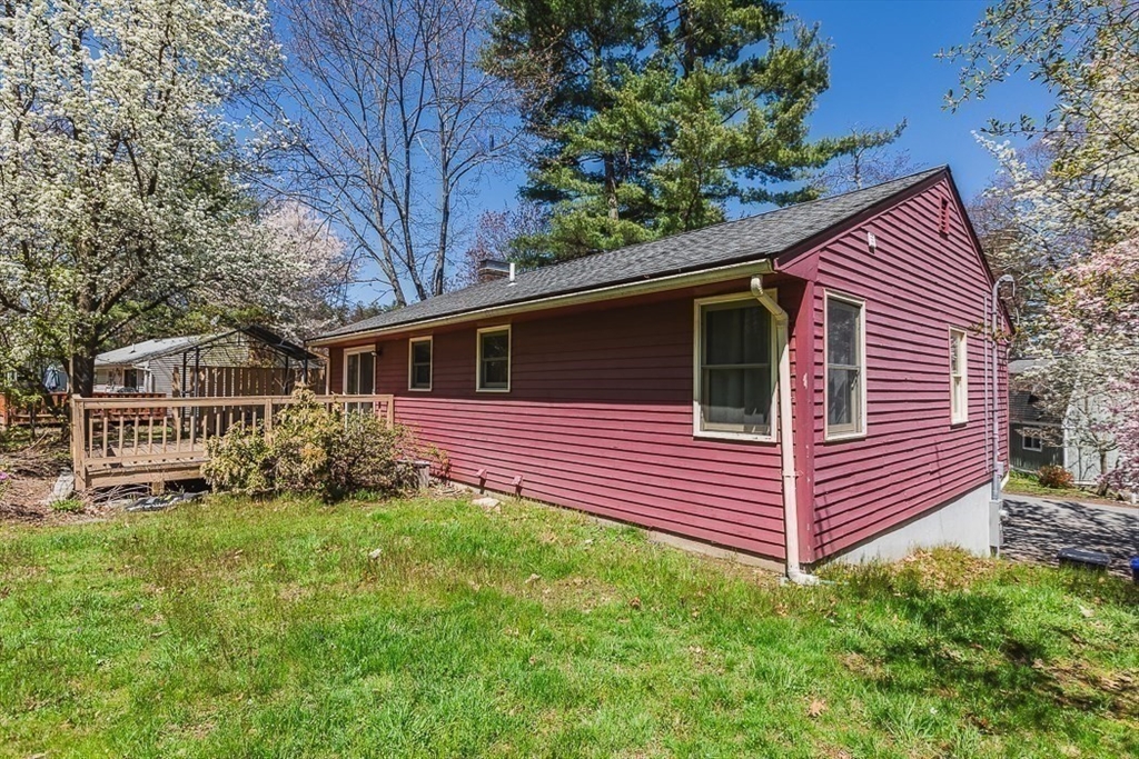 26 Hunter Avenue Hudson, MA 01749 - Photo 39 of 42 a front view of a house with a yard