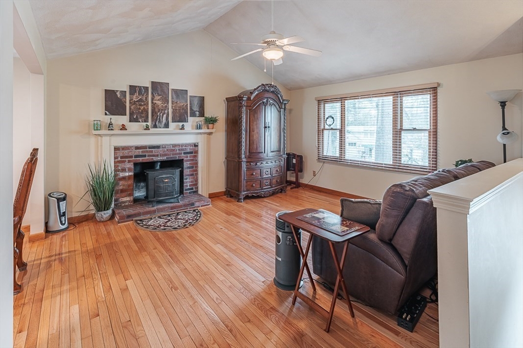 26 Hunter Avenue Hudson, MA 01749 - Photo 5 of 42 a living room with furniture fireplace and wooden floor