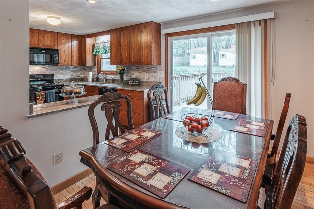 26 Hunter Avenue Hudson, MA 01749 - Photo 10 of 42 a living room with furniture and a window