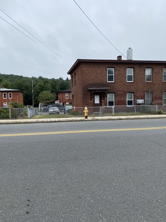 a view of the house with a street