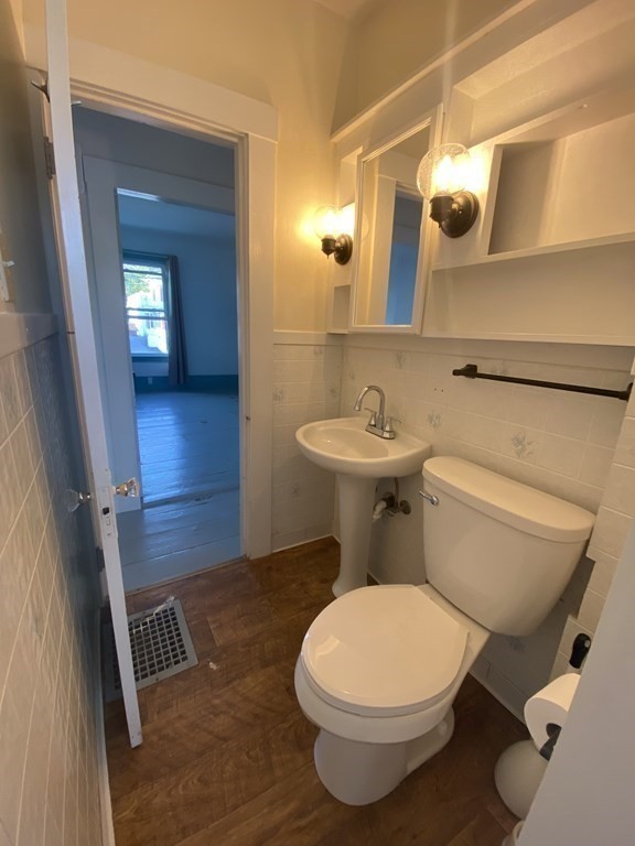 2271 Main Street Warren, MA 01092 - Photo 19 of 26 a bathroom with a toilet a sink and mirror