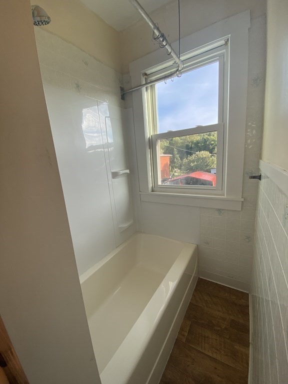 2271 Main Street Warren, MA 01092 - Photo 20 of 26 a bathroom with a tub and a window