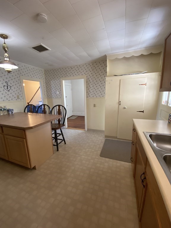 2271 Main Street Warren, MA 01092 - Photo 5 of 26 a view of a room with gym equipment and a window