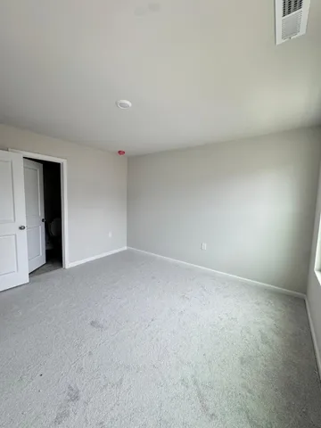 a bathroom with a sink vanity and a mirror