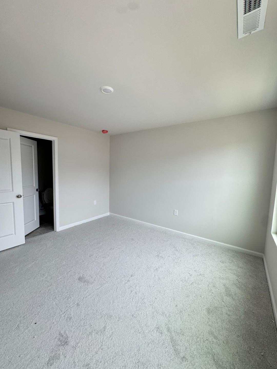 1038 Bristol Arch Drive Graham, NC 27253 - Photo 18 of 21 a view of an empty room