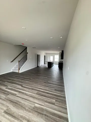 a view of a livingroom with wooden floor