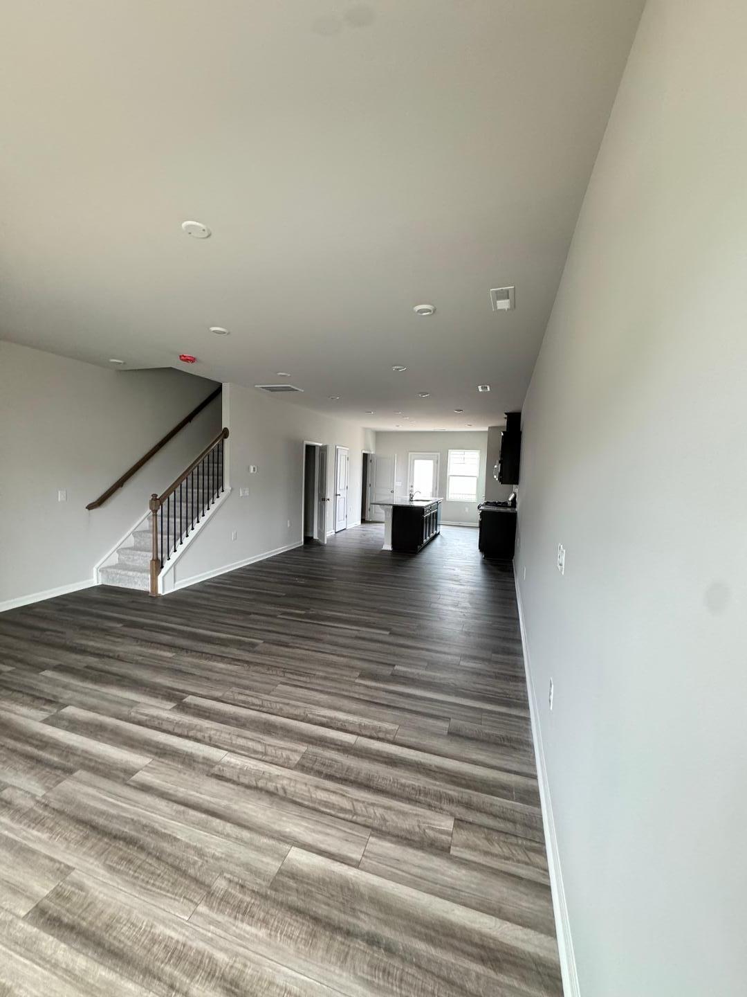 1038 Bristol Arch Drive Graham, NC 27253 - Photo 5 of 21 a view of empty room with wooden floor