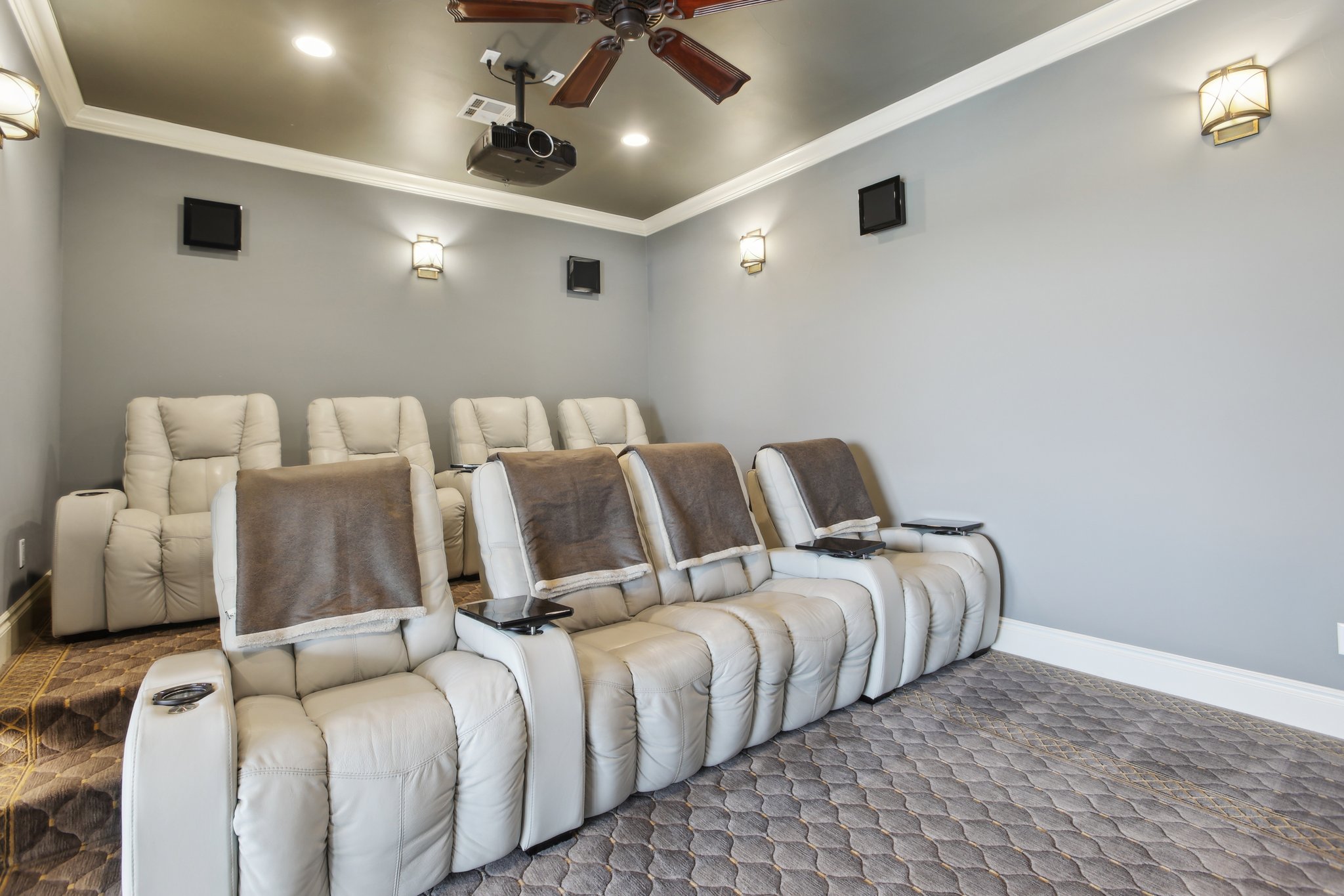 1353 Osprey Ridge Loop Lago Vista, TX 78645 - Photo 27 of 40 Fantastic media room on lower level has reclining chairs & 96” screen.