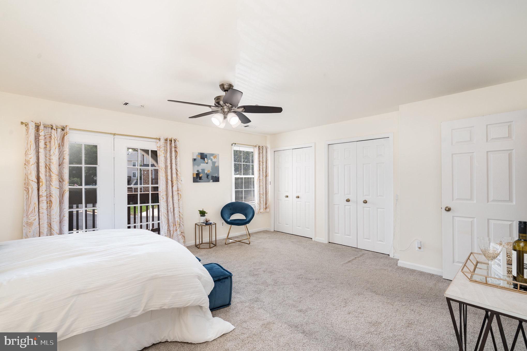 4068 Chetham Way Woodbridge, VA 22192 - Photo 18 of 27 a bedroom with a bed and window