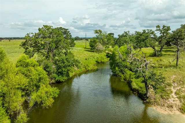 a view of a lake with a houses