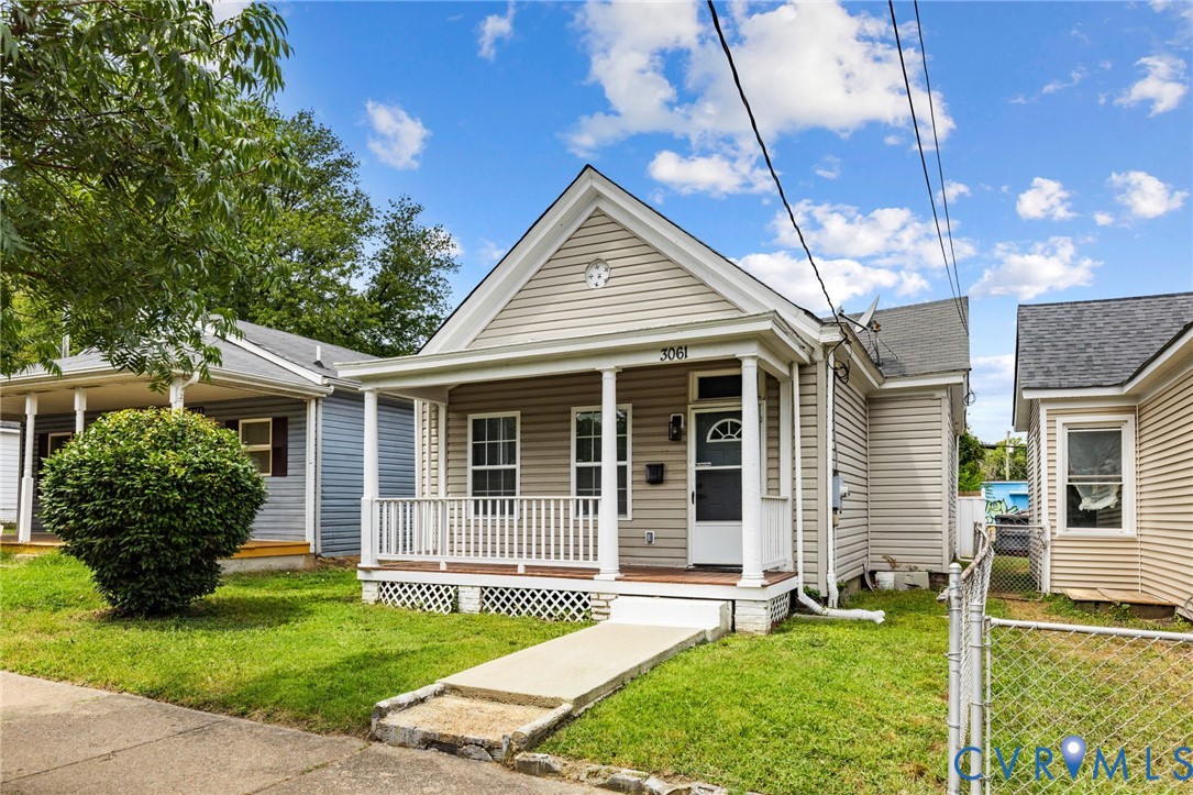 3061 Decatur Street Richmond, VA 23224 - Photo 2 of 23 a front view of a house with garden