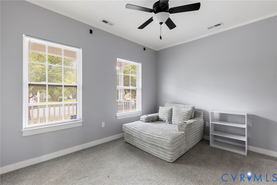 3061 Decatur Street Richmond, VA 23224 - Photo 3 of 23 a bedroom with furniture and window