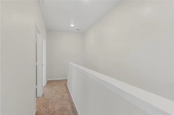 a view of hallway with closet