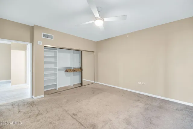 an empty room with a bathroom