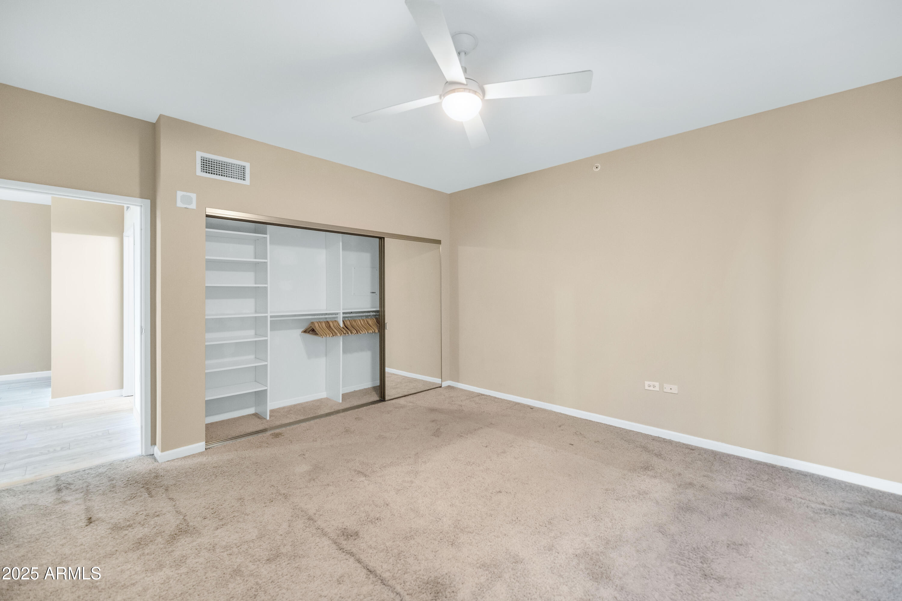 4808 North 24th Street, Unit 522 Phoenix, AZ 85016 - Photo 12 of 27 an empty room with a bathroom